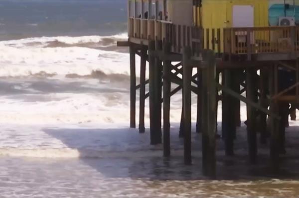 The surfer smashed his head on the piling of a pier, according to officials and loved ones.